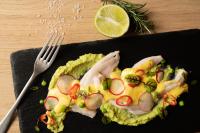 talerz jedzenia na stole z widelcem w obiekcie The HEY HOTEL w mieście Interlaken