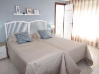 Postel nebo postele na pokoji v ubytování Apartment Tor Serena by Interhome