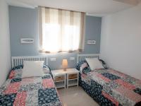 Postel nebo postele na pokoji v ubytování Apartment Tor Serena by Interhome