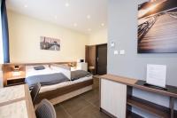 Posteľ alebo postele v izbe v ubytovaní Apartments Danube