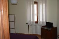 Televízia a/alebo spoločenská miestnosť v ubytovaní B&B San Russorio