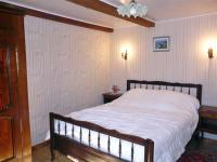 Cama ou camas em um quarto em Custren, Esquibien