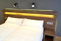 Posteľ alebo postele v izbe v ubytovaní Hotel Alda Sada Marina