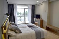 Posteľ alebo postele v izbe v ubytovaní Hotel Alda Sada Marina
