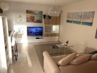 TV a/nebo společenská místnost v ubytování Primavera Tenerife