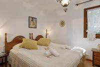 Postel nebo postele na pokoji v ubytování Villa La Torreta