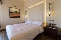 Al Badayer Retreat by Sharjah Collectionにあるベッド