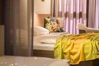 Posteľ alebo postele v izbe v ubytovaní hirschen dornbirn - das boutiquestyle hotel