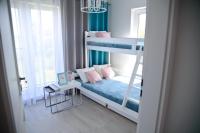 Posteľ alebo postele v izbe v ubytovaní Słoneczne Tarasy II - Apartments