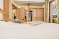 Łóżko lub łóżka w pokoju w obiekcie Hotel Sieghard Zillertal