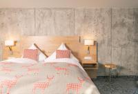 Genusshotel Hirschen - Erholung im Grünen (Südschwarzwald)にあるベッド