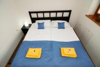 Postel nebo postele na pokoji v ubytování Pierta Apartment