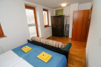 Postel nebo postele na pokoji v ubytování Pierta Apartment