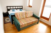 Postel nebo postele na pokoji v ubytování Pierta Apartment
