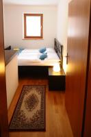 Postel nebo postele na pokoji v ubytování Pierta Apartment
