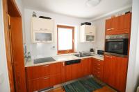Kuchyň nebo kuchyňský kout v ubytování Pierta Apartment