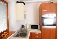 Kuchyň nebo kuchyňský kout v ubytování Pierta Apartment