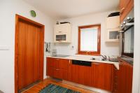 Kuchyň nebo kuchyňský kout v ubytování Pierta Apartment