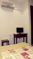 Telewizja i/lub zestaw kina domowego w obiekcie Hostal el Volao