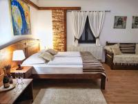 Posteľ alebo postele v izbe v ubytovaní Etno Garden Exclusive Rooms