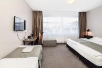 Postel nebo postele na pokoji v ubytování Bella Apartments & Rooms