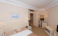 L'Orient Palace Resort and Spaにあるベッド