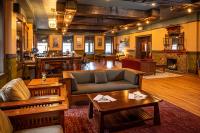 a living room filled with furniture and a fireplace at 1905 Basin Park Hotel in Eureka Springs