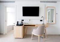 TV a/nebo společenská místnost v ubytování Hotel Lava Beach