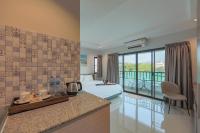 Posezení v ubytování Nalanta Hotel Pattaya