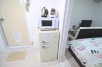Comfort CUBE PHOENIX MIYAZAKIにあるキッチンまたは簡易キッチン