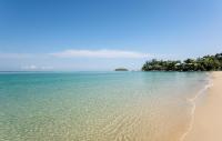 a view of a beach with the ocean at Katathani Phuket Beach Resort - SHA Extra Plus in Kata Beach