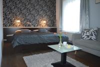 Postel nebo postele na pokoji v ubytování Hotel Peregrin