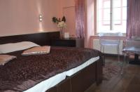 Postel nebo postele na pokoji v ubytování Hotel Peregrin