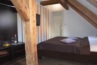 Postel nebo postele na pokoji v ubytování Hotel Peregrin