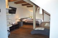Postel nebo postele na pokoji v ubytování Hotel Peregrin