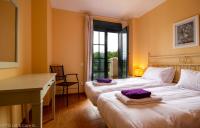 Posteľ alebo postele v izbe v ubytovaní (SLE001) 3 Bedroom Golf Apartment
