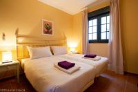 Posteľ alebo postele v izbe v ubytovaní (SLE001) 3 Bedroom Golf Apartment