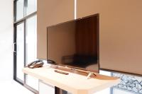 TV a/nebo společenská místnost v ubytování Chill D Resort Buriram