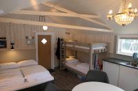 Postel nebo postele na pokoji v ubytování Velfjord Camping & Hytter