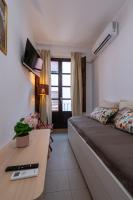 TV a/nebo společenská místnost v ubytování Apartamento San Matías Alto Centro