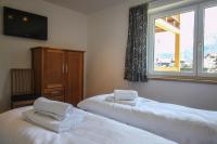Posteľ alebo postele v izbe v ubytovaní Tauern Relax Lodges by we rent, SUMMERCARD INCLUDED