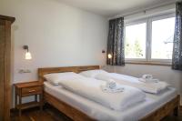 Posteľ alebo postele v izbe v ubytovaní Tauern Relax Lodges by we rent, SUMMERCARD INCLUDED