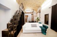 Posteľ alebo postele v izbe v ubytovaní Post Industrial Loft Trastevere - Top Collection