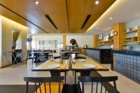 En restaurant eller et andet spisested på Grand Sappaya Hotel by Lotus Valley Golf