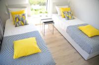 Posteľ alebo postele v izbe v ubytovaní Słoneczne Tarasy II - Apartments