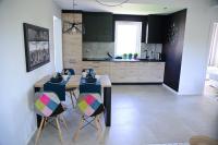Kuchyňa alebo kuchynka v ubytovaní Słoneczne Tarasy II - Apartments