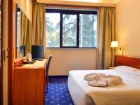 Posteľ alebo postele v izbe v ubytovaní Mercure Reggio Emilia Centro Astoria