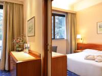 Posteľ alebo postele v izbe v ubytovaní Mercure Reggio Emilia Centro Astoria