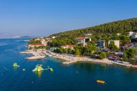 an aerial view of a beach with boats in the water at Hotel Sveti Kriz in Trogir