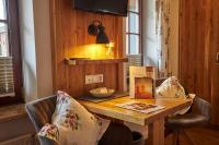 TV a/nebo společenská místnost v ubytování Flair Landhotel Strengliner Mühle